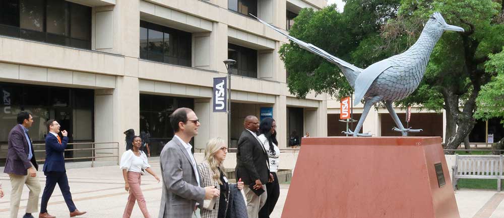 Centurions walk through UTSA central campus