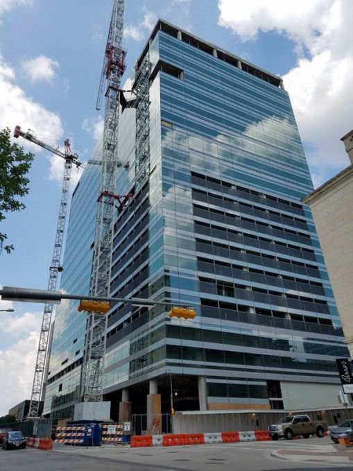 Exterior view of the new UT System building from 7th Street looking west.