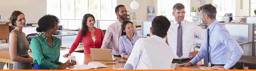 Coworkers collaborating at a meeting discussing ideas