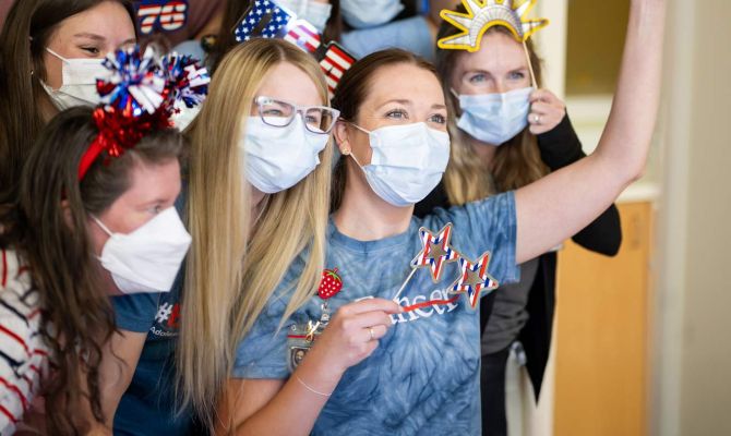 A group of child patients cheering