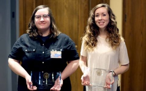 Samantha Jones and Catherine Cleary holding their awards.