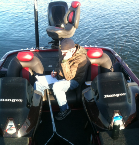 Dan Sharphorn, UT System's Vice Chancellor and General Counsel, tackles some work in the fishing boat.